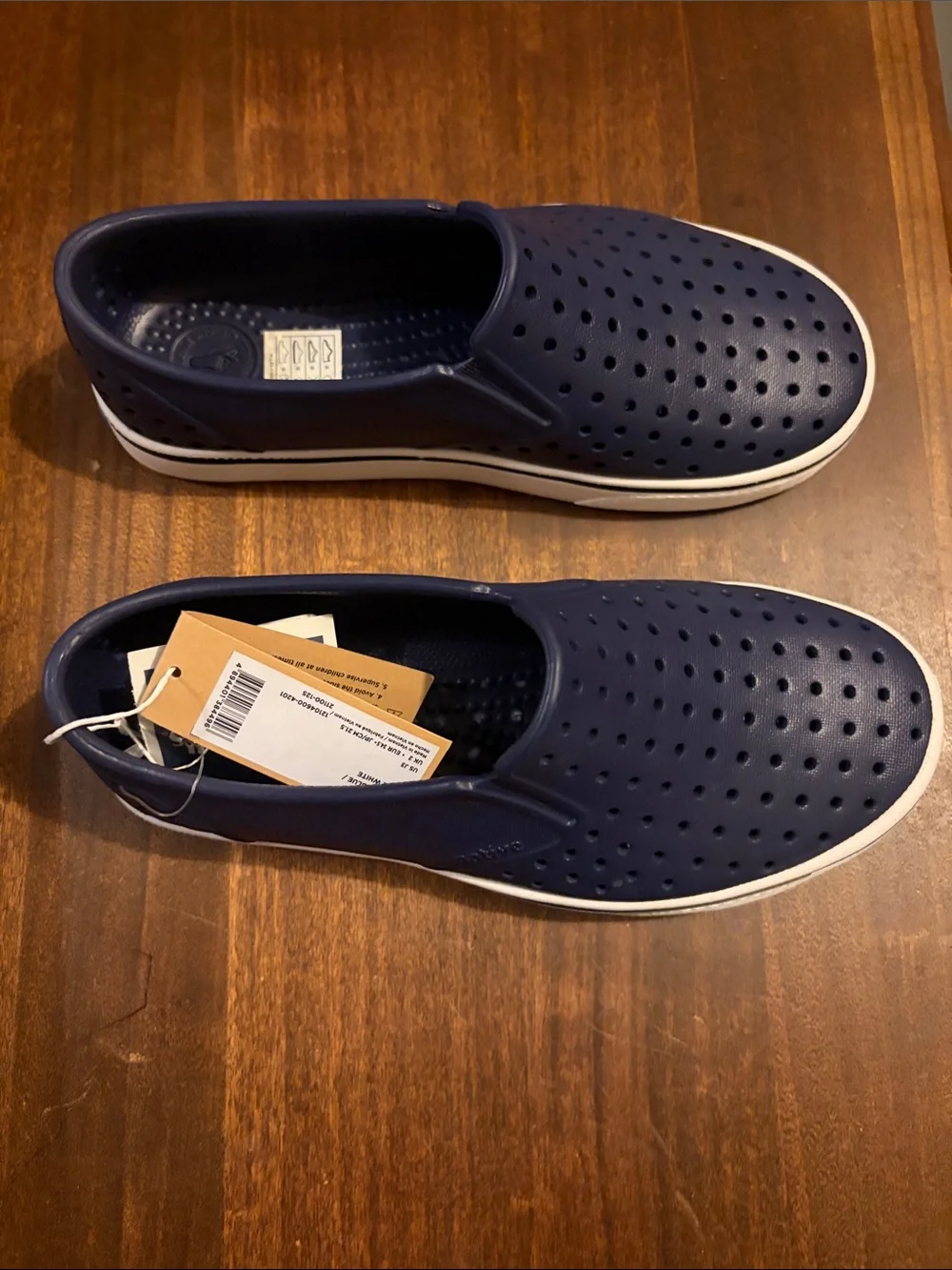 Native Slip-On Shoes in Navy with White Trim
